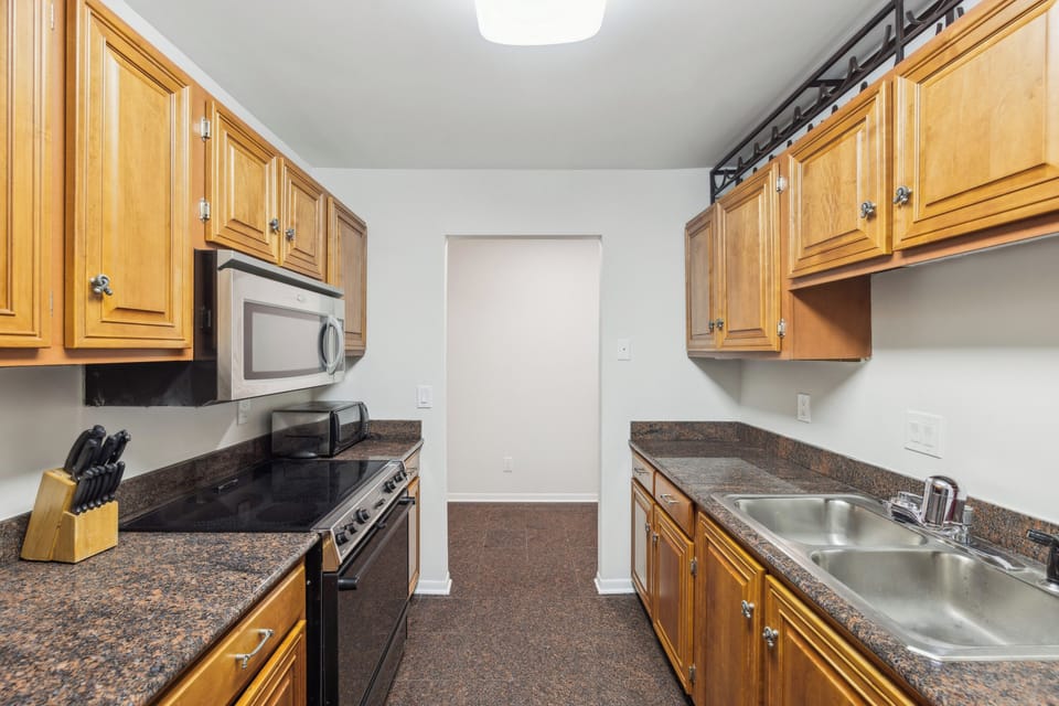 Fully stocked kitchen and stainless steel appliances