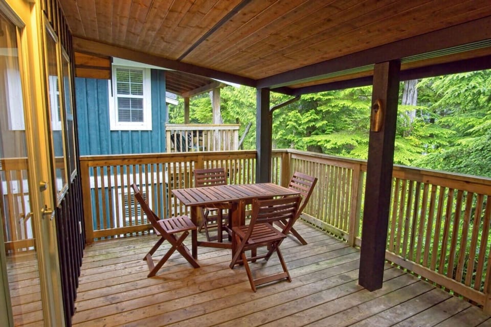 Covered deck with forest view