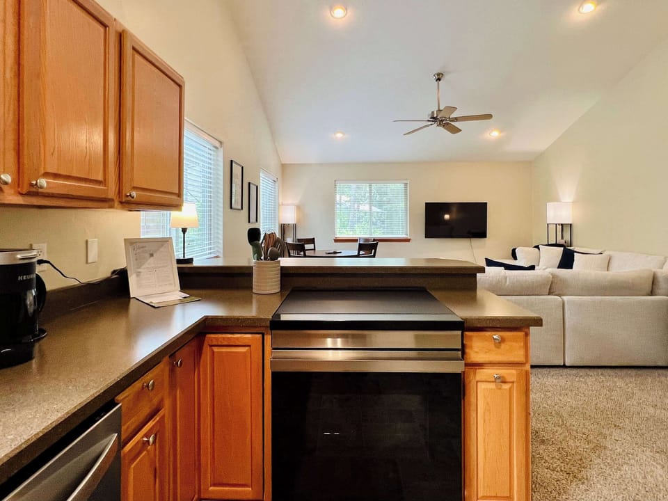 KitchenAid mixer, coffee pot, toaster and instaPot in this fully equipped kitchen