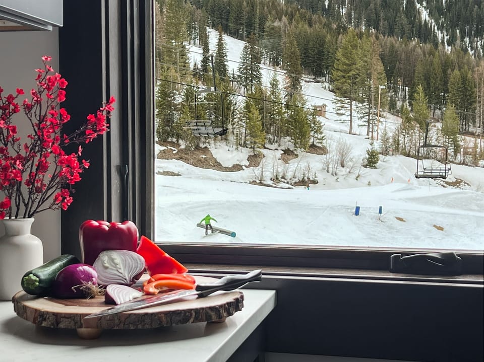 You will relish breathtaking views of the ski slopes from the chalet window.