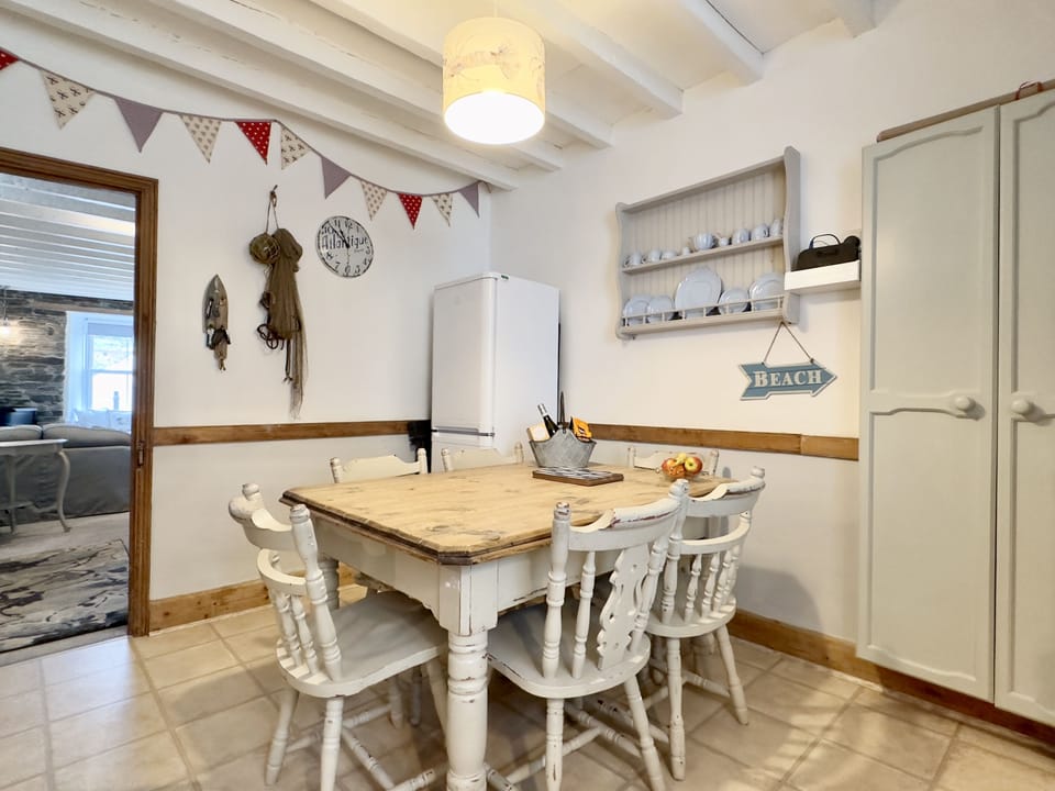 Kitchen leading to lounge at at 10 Mill Road