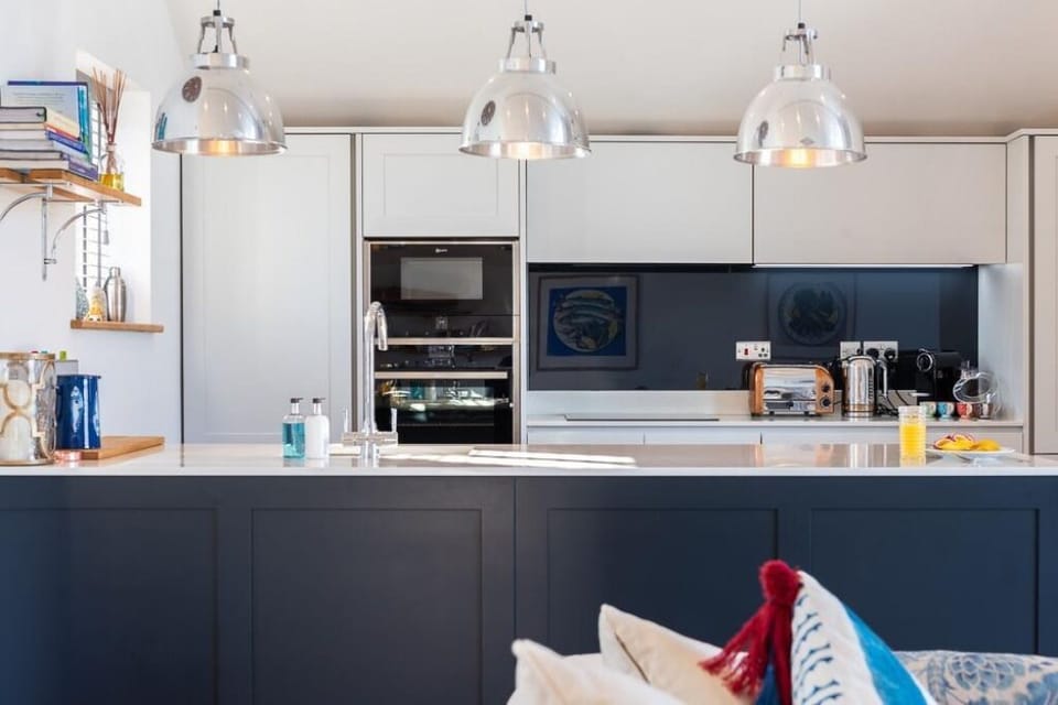 Open plan kitchen with breakfast bar