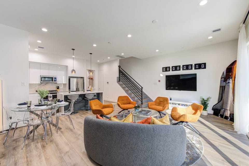 Open floor plan concept featuring living room, dining area, and kitchen.