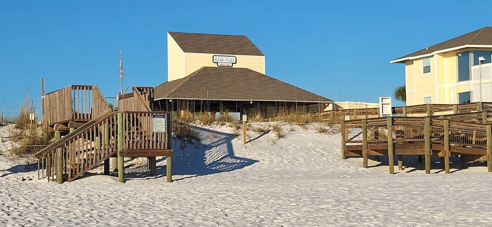 Ramp-accessible dune walkover from the beachside bar to the Gulf shoreline.