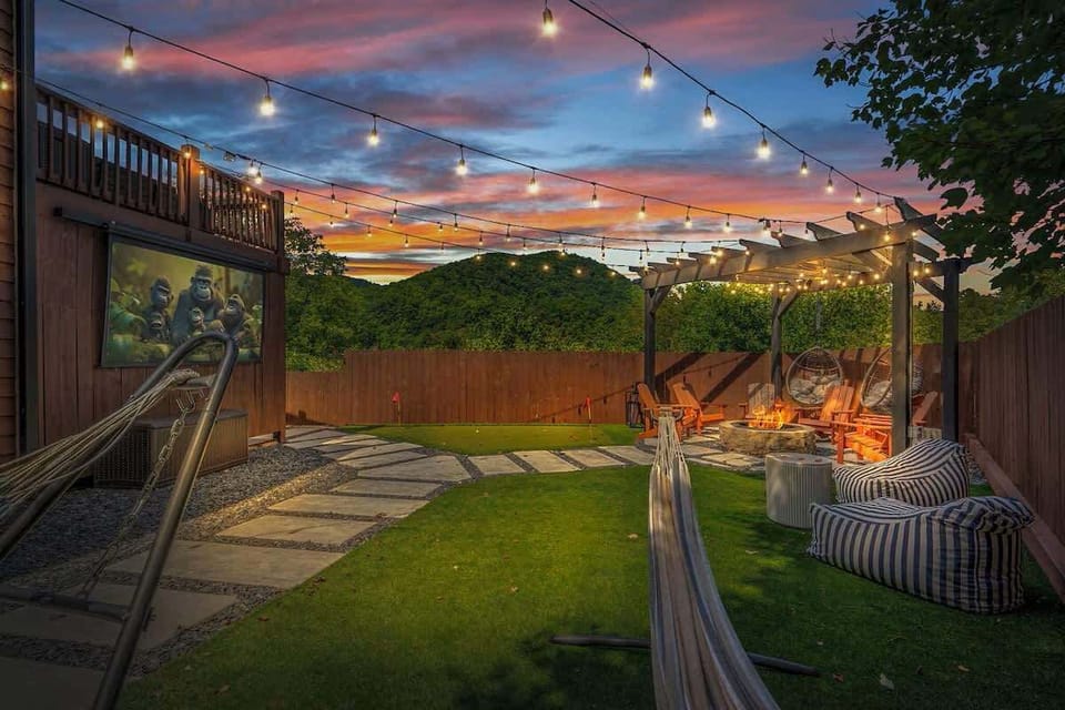 Private outdoor hot tub set beside the deck for relaxing evening soaks