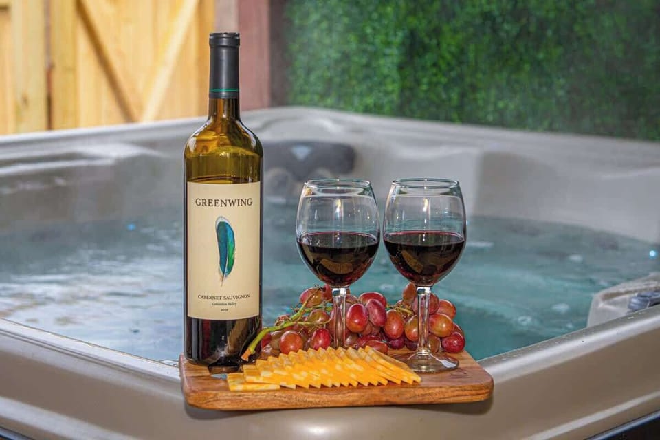 Enjoy wine & cheese while soaking in the bubbling outdoor hot tub