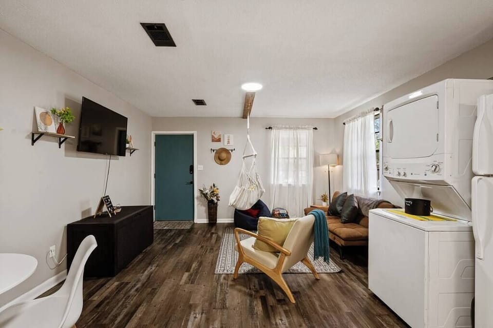 Cozy living area w/ sofa seating, natural light & a relaxed, homey feel