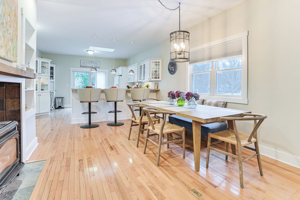 Dining Area | Gas Fireplace | In-Unit Laundry