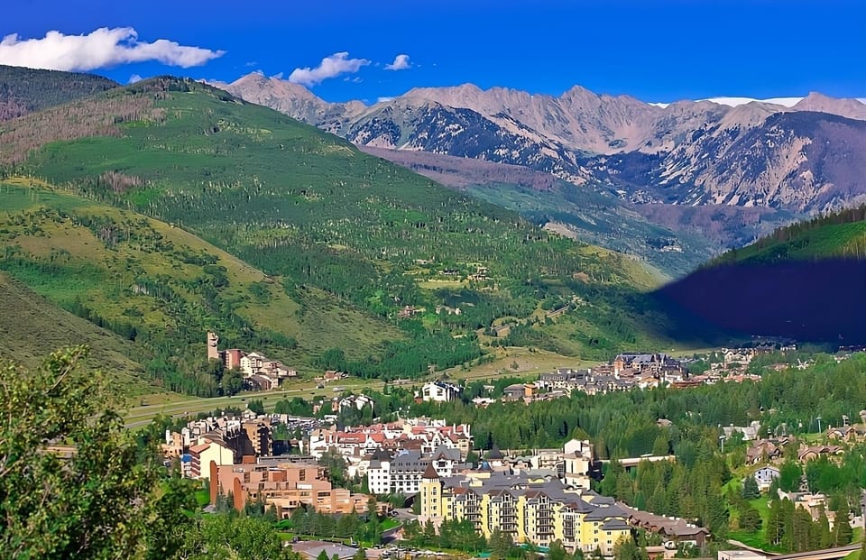 Explore sunny alpine trails and charming town views in summer.