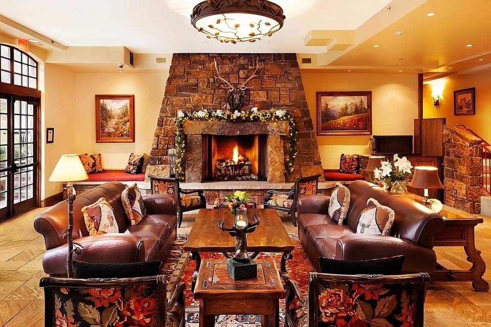 Sink into leather sofas and savor fireside après-ski warmth