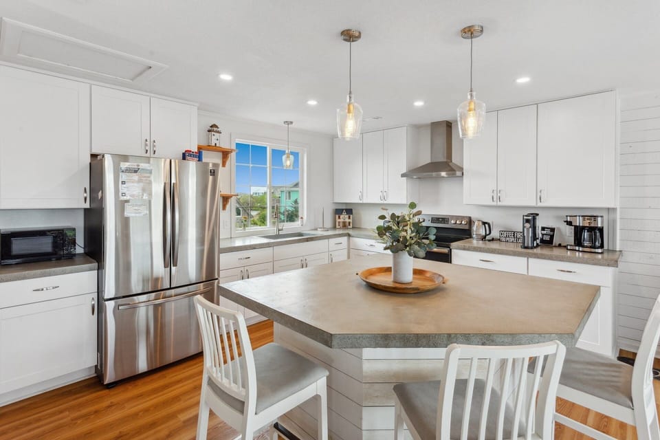 Whip up something delicious that the whole family will love in the Top-Level Kitchen with views of the lake!