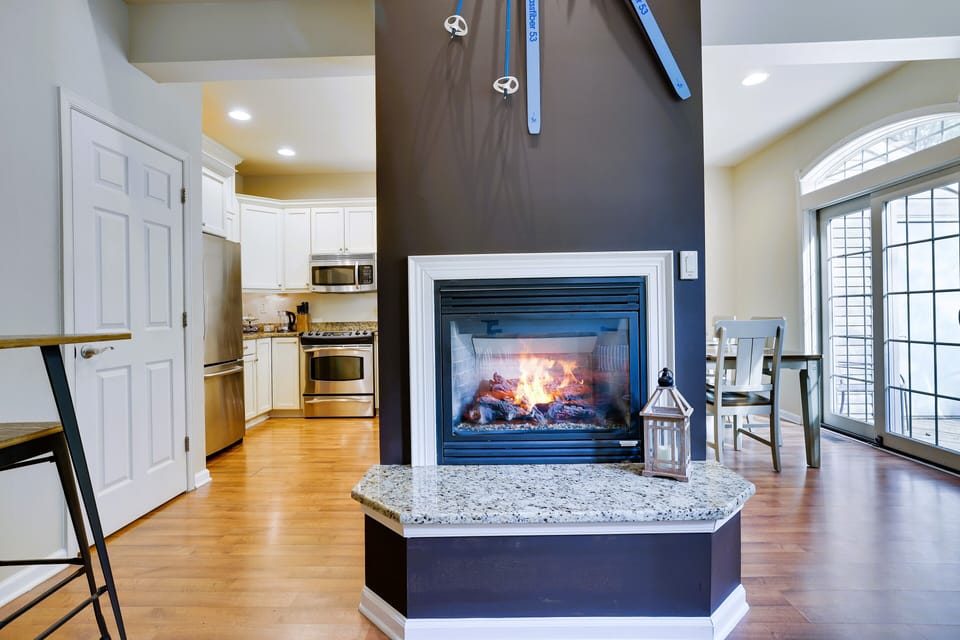 Gas fireplace in the center of the main floor living room 
