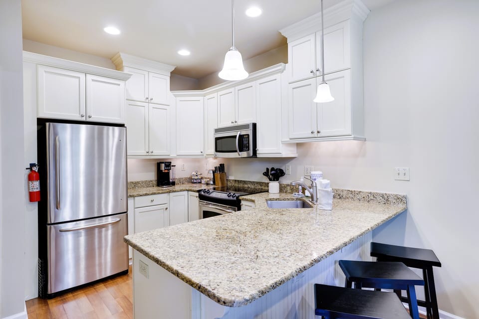 Bright and airy kitchen with plenty of prep space to feed the gang!