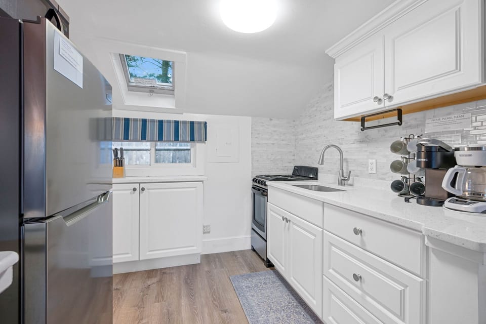 Kitchen with stove and fridge