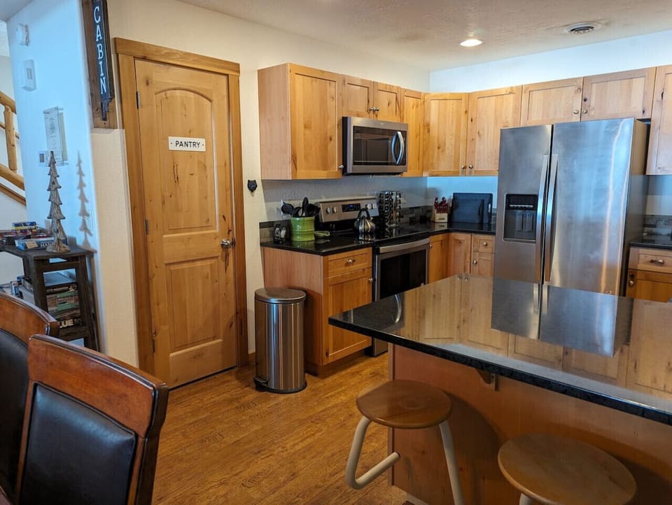 Kitchen with Bar Seating for 3