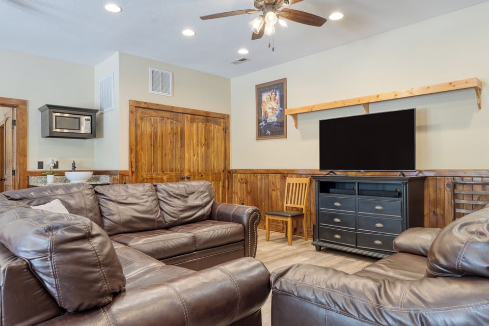 Kick back between rounds on the plush seating in the game room.