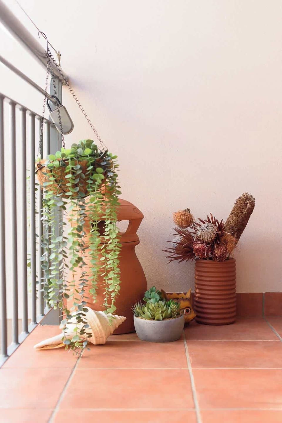 Step onto your private outdoor space and be greeted by lush greenery, thoughtfully arranged to create a tranquil oasis. It's the perfect spot to enjoy your morning coffee or simply unwind amidst nature's calm.