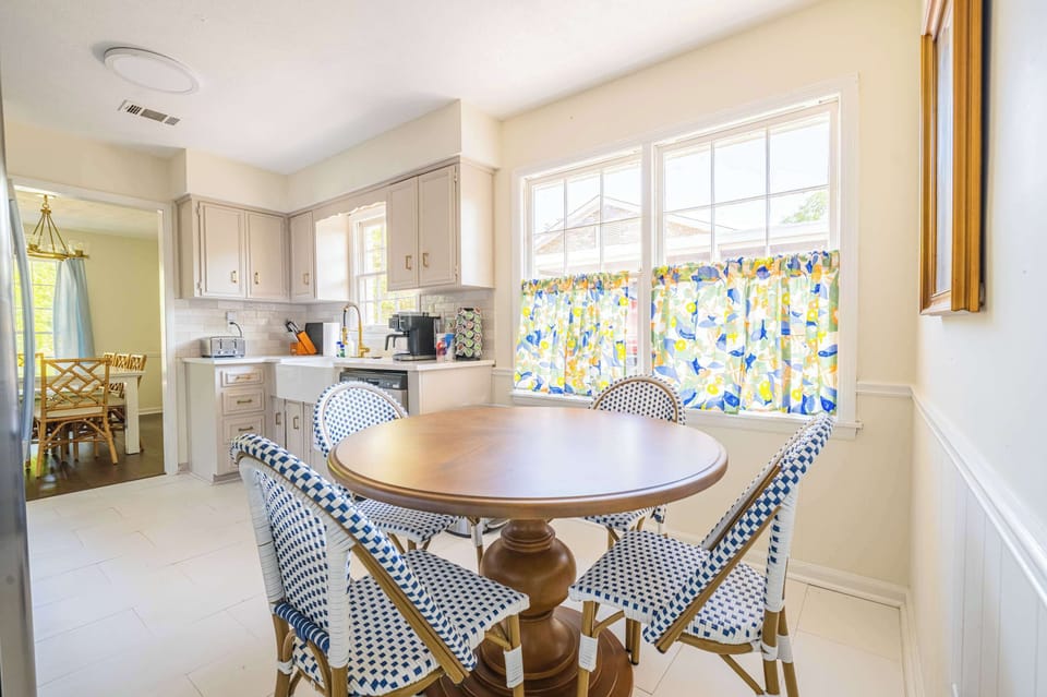 Start your day right in this bright and cheerful dining nook. Perfect for enjoying breakfast together or planning your next adventure.

