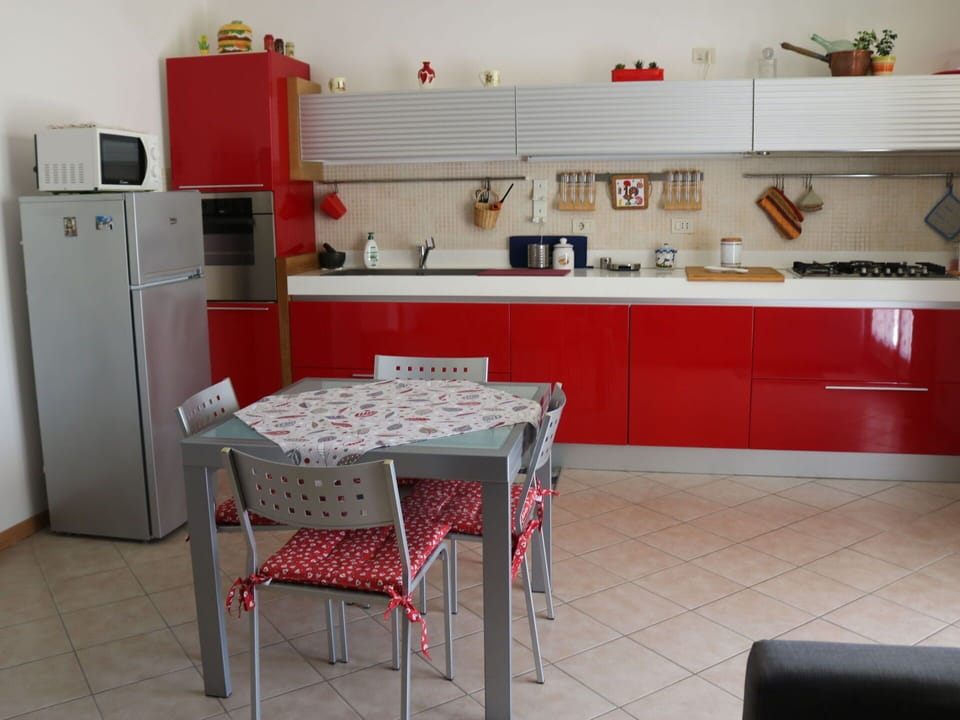 Kitchen, Furniture, Major Appliance, Kitchen Appliance, Flooring, Interior Design, Countertop, Kitchen Stove, Cabinetry, Floor