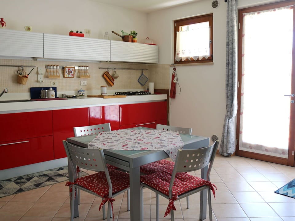 Furniture, Kitchen, Interior Design, Flooring, Kitchen Appliance, Countertop, Wood, Major Appliance, Chair, Floor