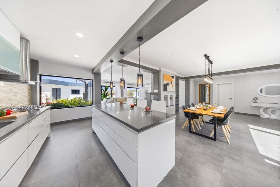 Indoor-outdoor dining with natural light & style.