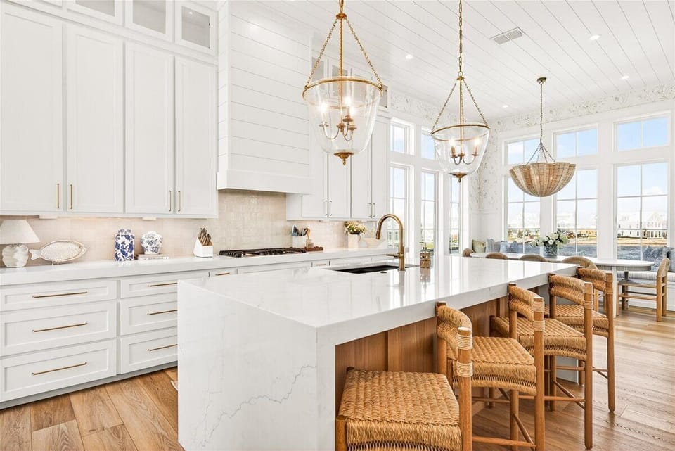 Kitchen, 2nd Floor - Featuring panoramic lake views and balcony access.