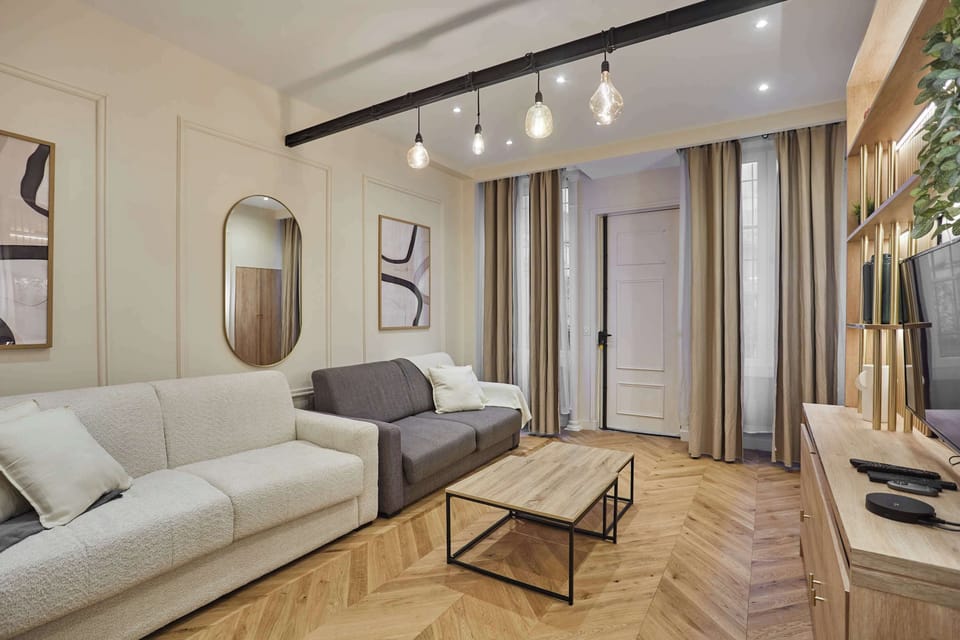 Salon avec 2 canapés lits