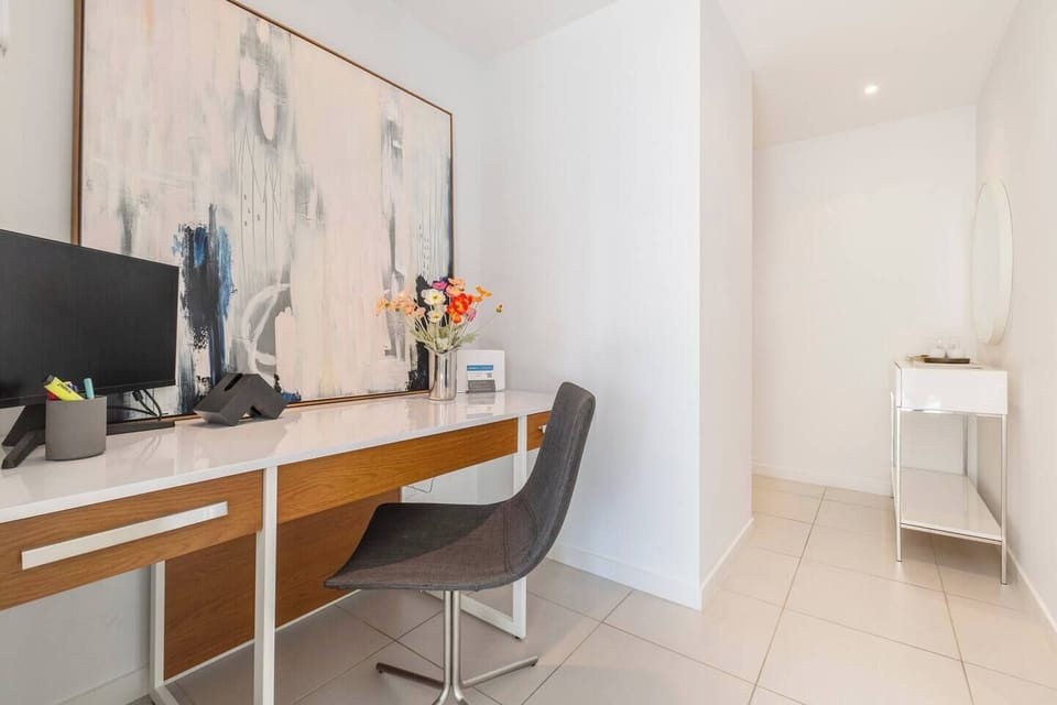Whether you're working remotely or journaling your day, the spacious desk, swivel chair, and monitor make productivity feel effortless.