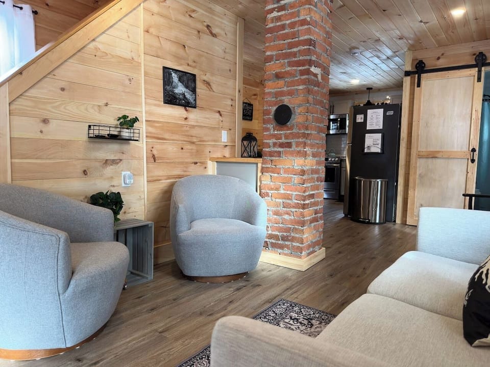 Experience the essence of a cozy cabin getaway right in the living room.
