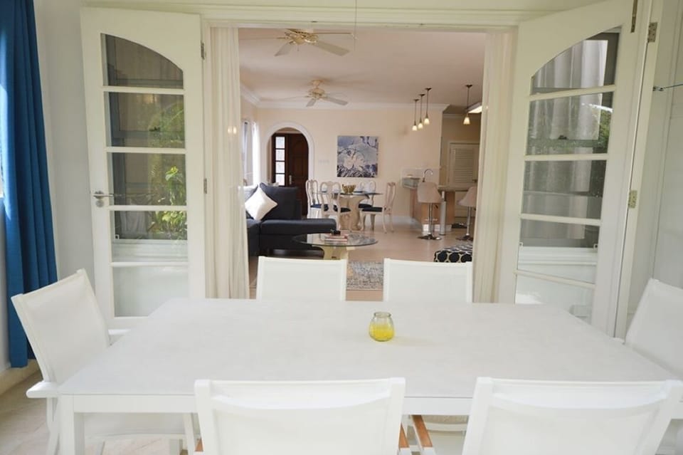 Outdoor dining on looking living area