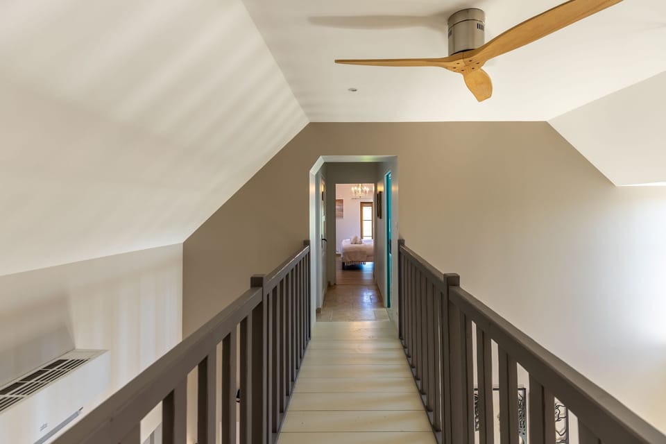 Mezzanine walkway leading to bedroom