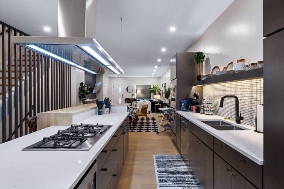 Sleek & Ready – Professional design meets everyday ease with a full gas range and endless counter space.