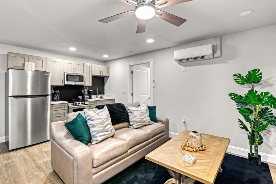 Full Kitchen 1  and Living Room Space 1 (of 2)  with queen size sleeper sofa
