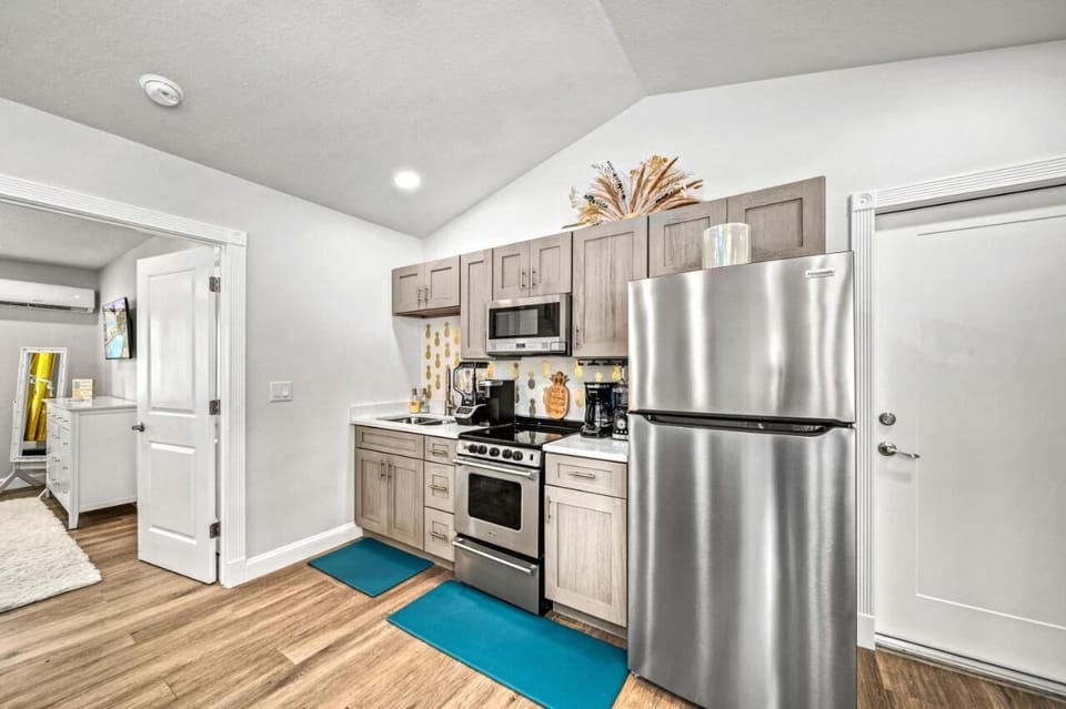 Kitchen: Whip up delicious meals in a bright, stylish kitchen featuring modern appliances!

