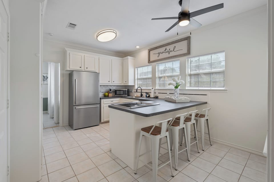 Cute kitchen with bar style seating