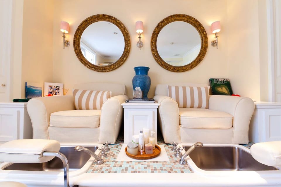 Indulge in pampering moments with plush seating and soft glow.