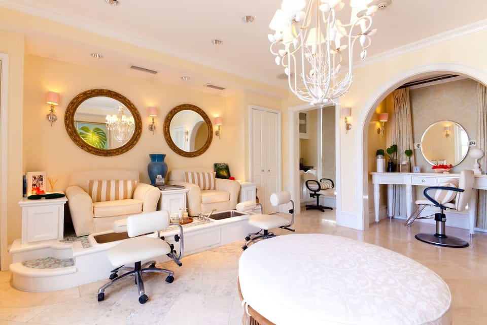 Unwind with a full-service spa atmosphere, serene and chic.