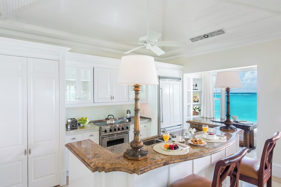 Sip morning coffee at the bar with sparkling ocean views.