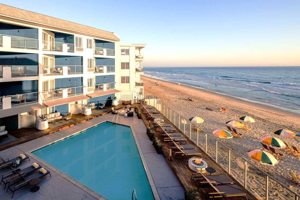 Soak in oceanfront pool views and golden-hour beach vibes