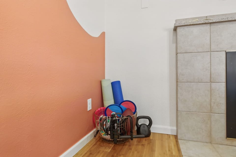 A stack of outdoor game and exercise equipment, perfect for a fun family day