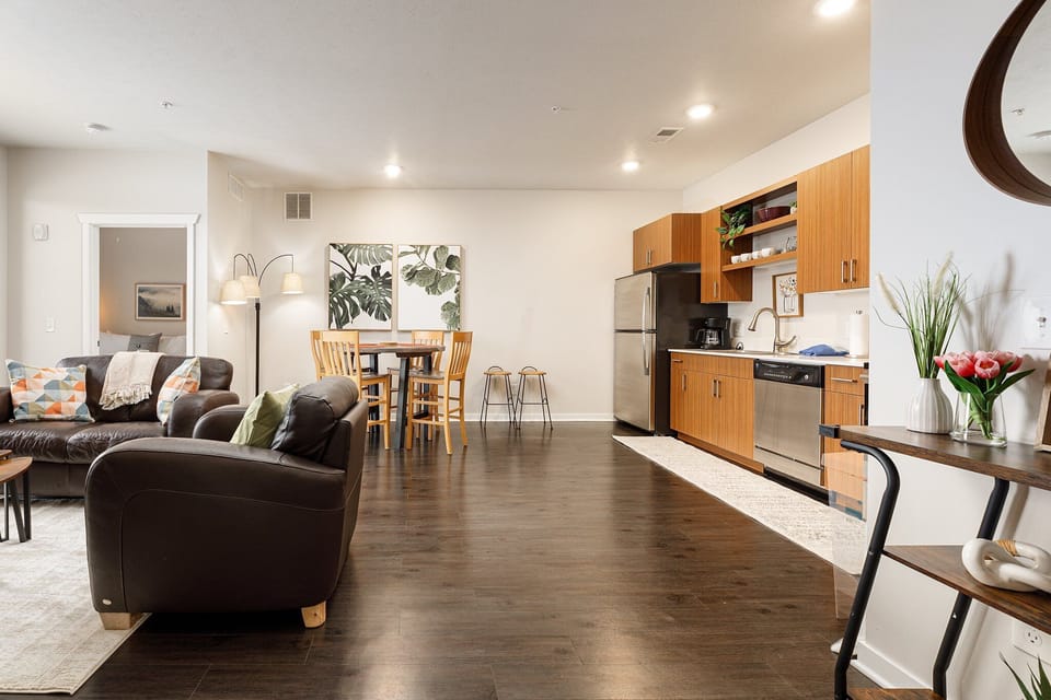 Bright open layout w/ seamless flow from kitchen to dining & living spaces.