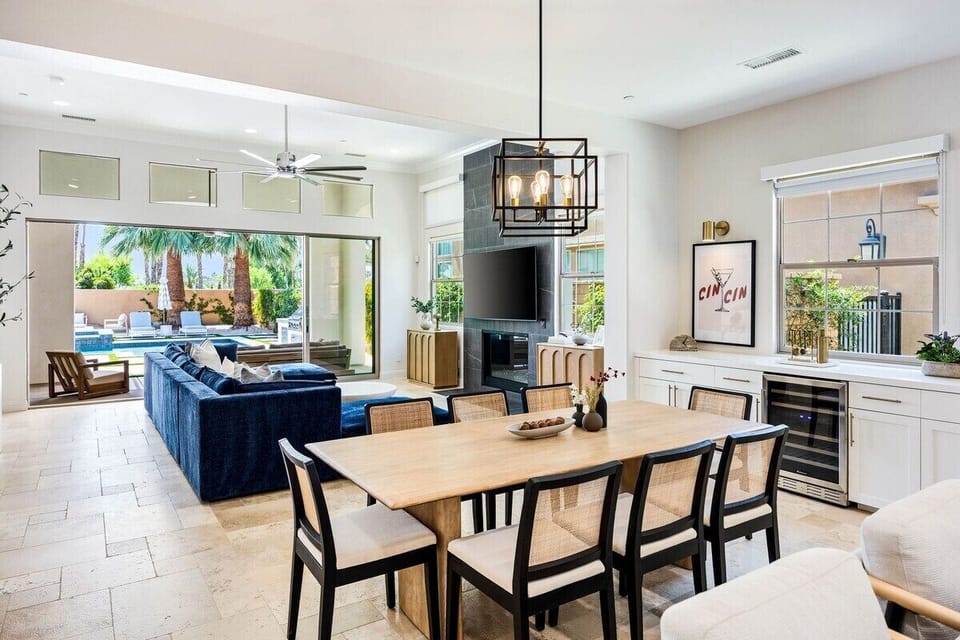 Open floor plan connects the living room, dining area, and kitchen.