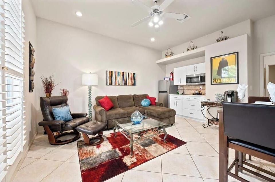 Living room with pullout sofa bed and  kitchenette with nuwave oven and hotplate