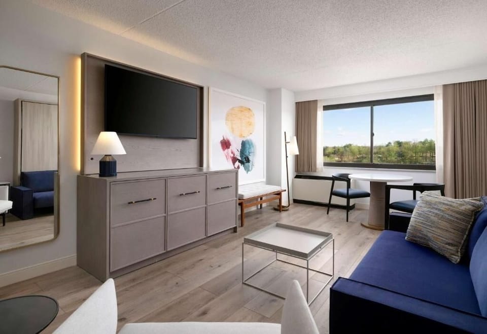 Unwind on the sofa with expansive window views.