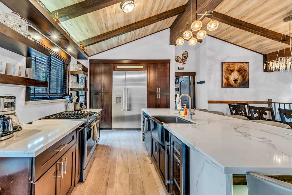 Kitchen: Upper floor, drip coffee maker, Crockpot, waffle maker, blender, toaster, cooking utensils, tableware