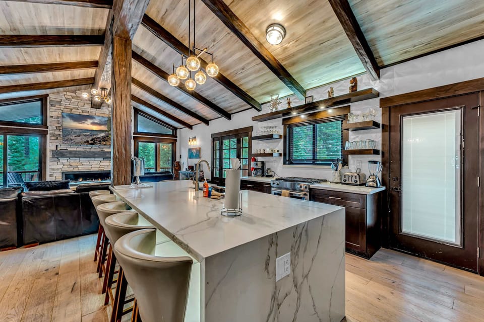 Kitchen: Upper floor, drip coffee maker, Crockpot, waffle maker, blender, toaster, cooking utensils, tableware