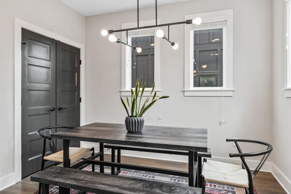 Spacious & bright dining room with seating for six around the table. Enjoy a meal or carry-out from one of the many East Nashville local eateries.