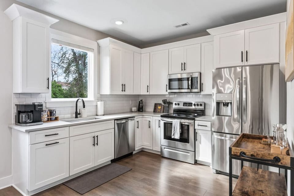 Enjoy the bright, spacious and fully-equipped kitchen for all your cooking needs. Stainless steel appliances, coffee maker, and all the utensils you might need are provided.