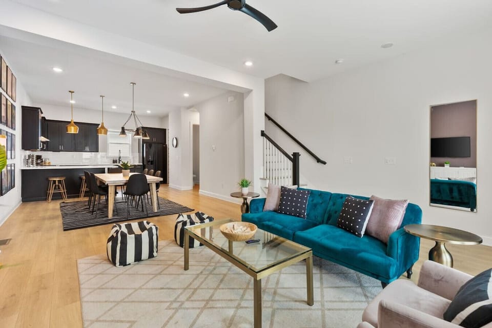 Sit back and relax in this spacious, inviting living room with a comfortable sofa bed, plenty of seating, a Juliet balcony, and a Smart TV with all the streaming services available to you.