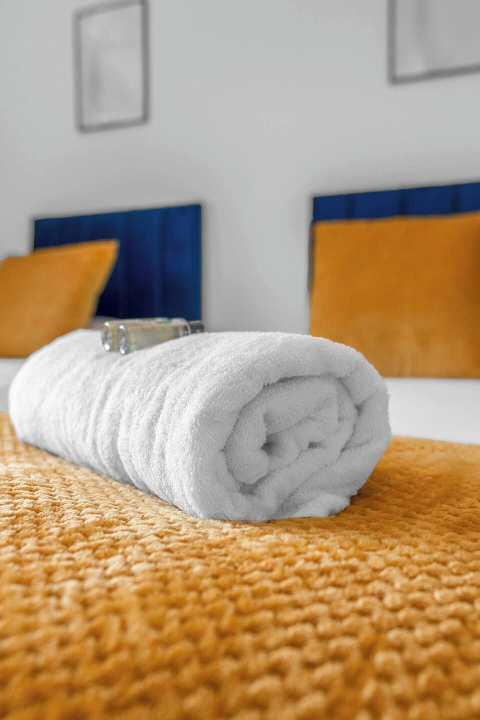 Modern charm with a splash of sunshine, this room offers both restful sleep and uplifting vibes.